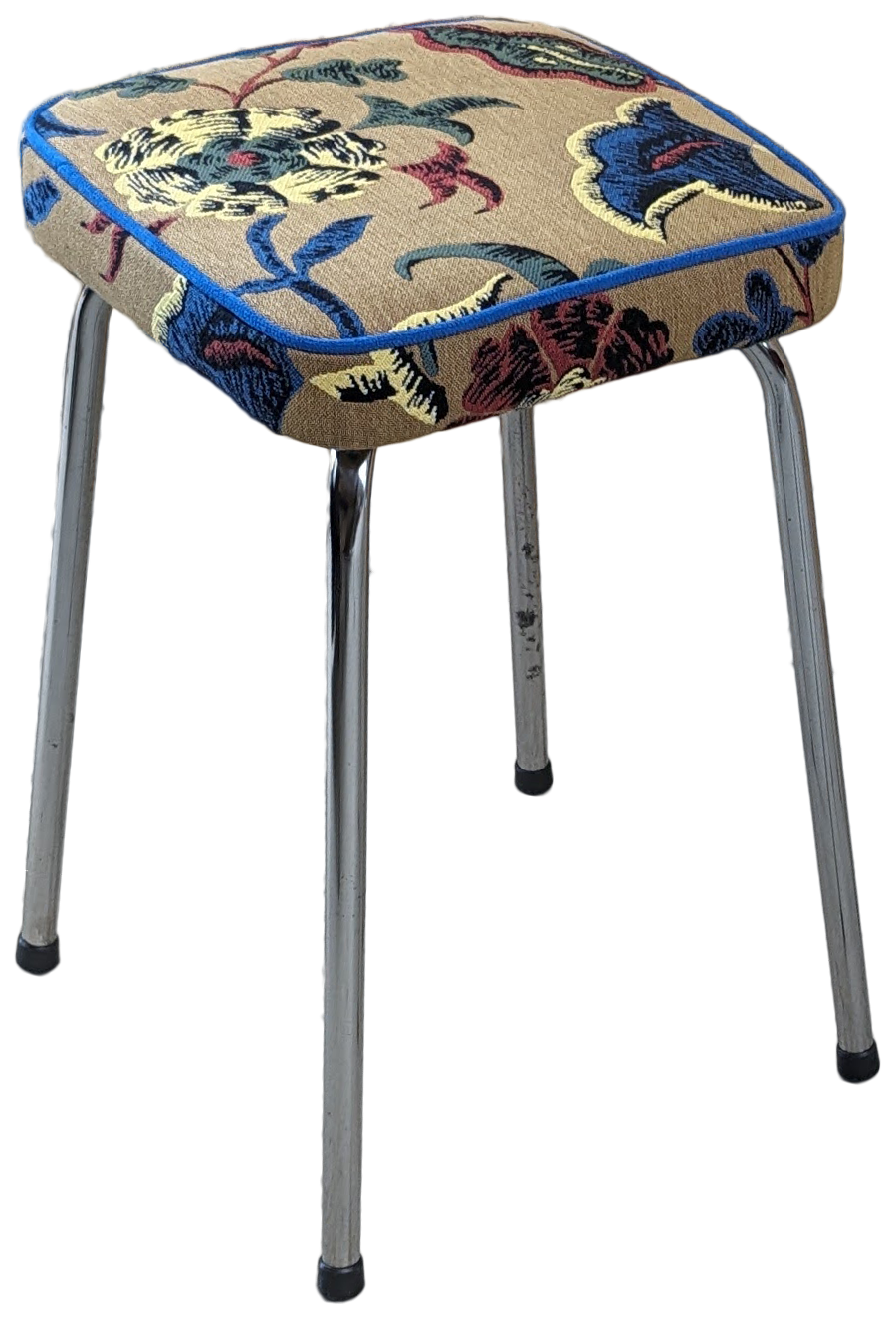 Tabouret restauré avec tissu à motifs colorés et passepoil bleu, travail de tapisserie d'ameublement réalisé à Rennes